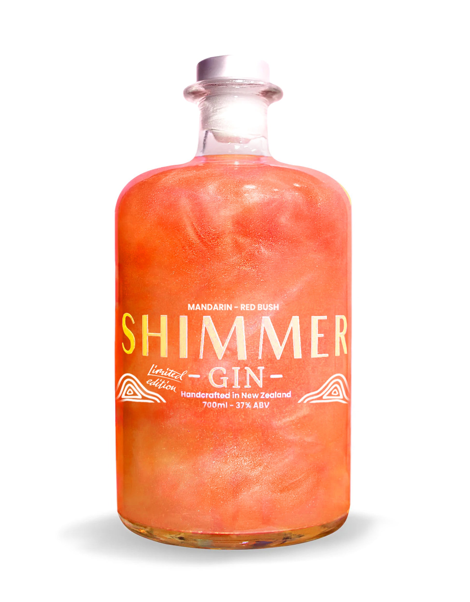 A clear glass bottle of Shimmer Gin with a white cap, filled with a vibrant orange-pink liquid. The label features the brand name 'SHIMMER' in large gold letters, with 'GIN' written below in white, and 'MANDARIN - RED BUSH' at the top.